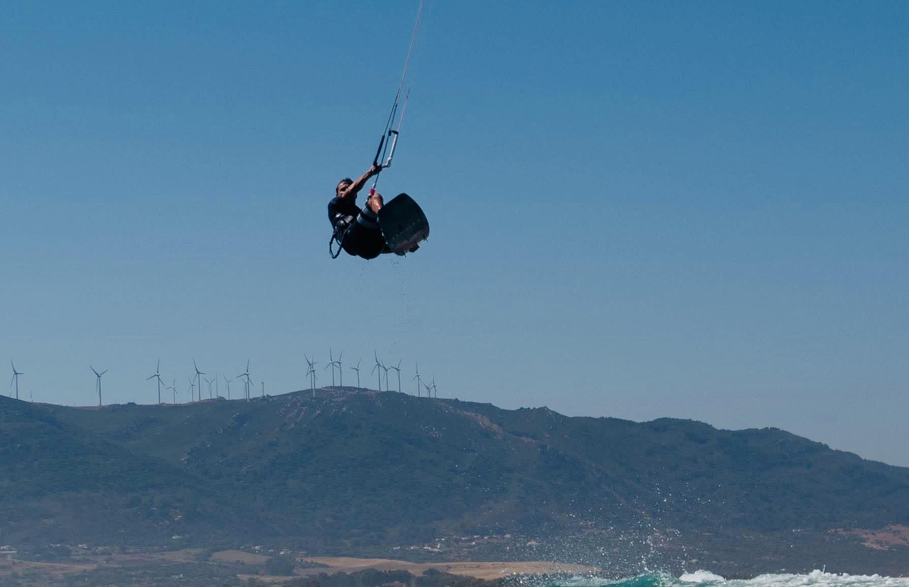 Kitesurfer high above the water